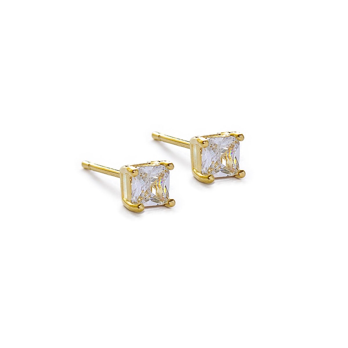 aretes punto de luz con circonita cubica de 0.3 cm cristal elaborado en oro laminado de AMBAR Joyería