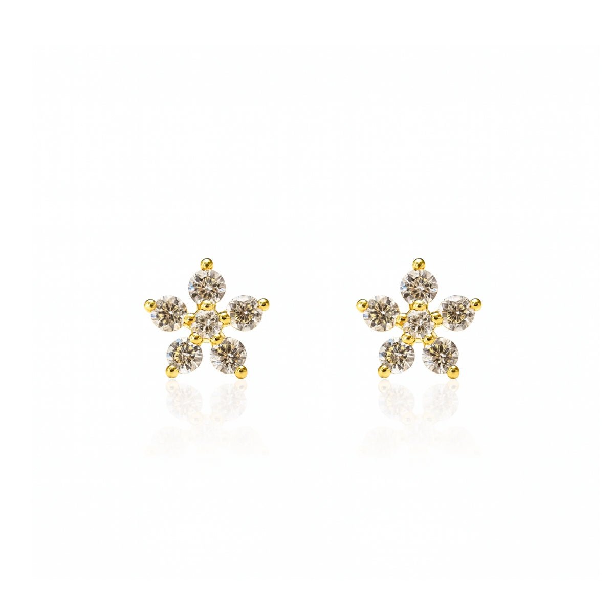 arete florecita dani de 5 pétalos con cristal de frente elaborado en oro laminado de AMBAR joyería
