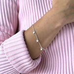 pulsera de estrellitas colgantes en modelo de cerca elaboradas en plata 925 para AMBAR joyería