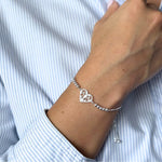 pulsera con sistema regulable y dije de corazones 3 en 1 en modelo elaborada en plata 925 de AMBAR Joyería Fina