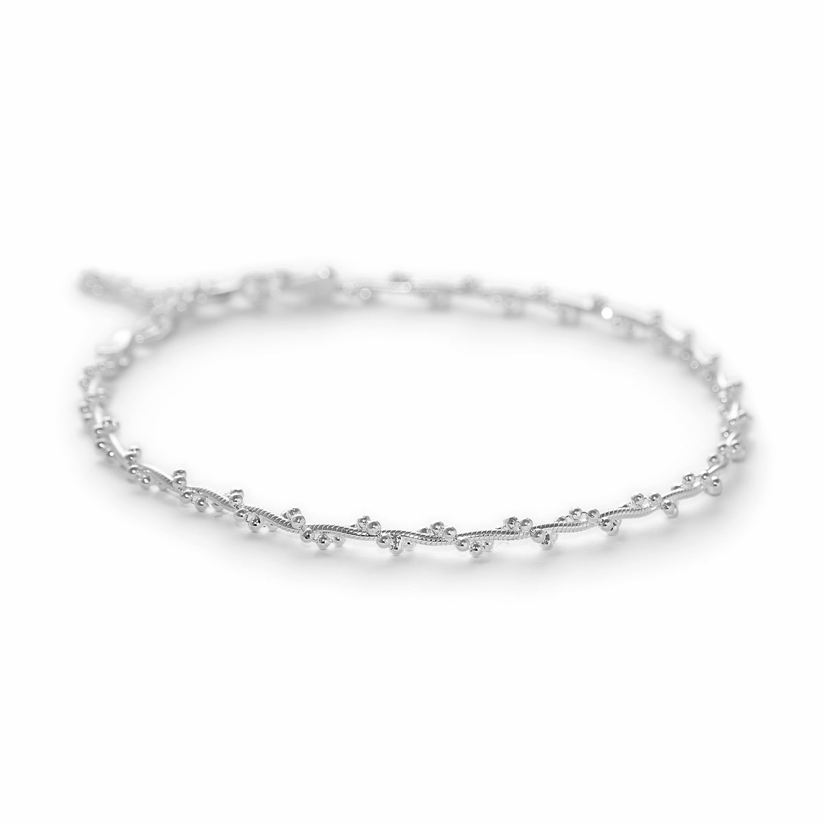 pulsera trenzada con bolitas con extension elaborada en plata 925 de AMBAR joyería