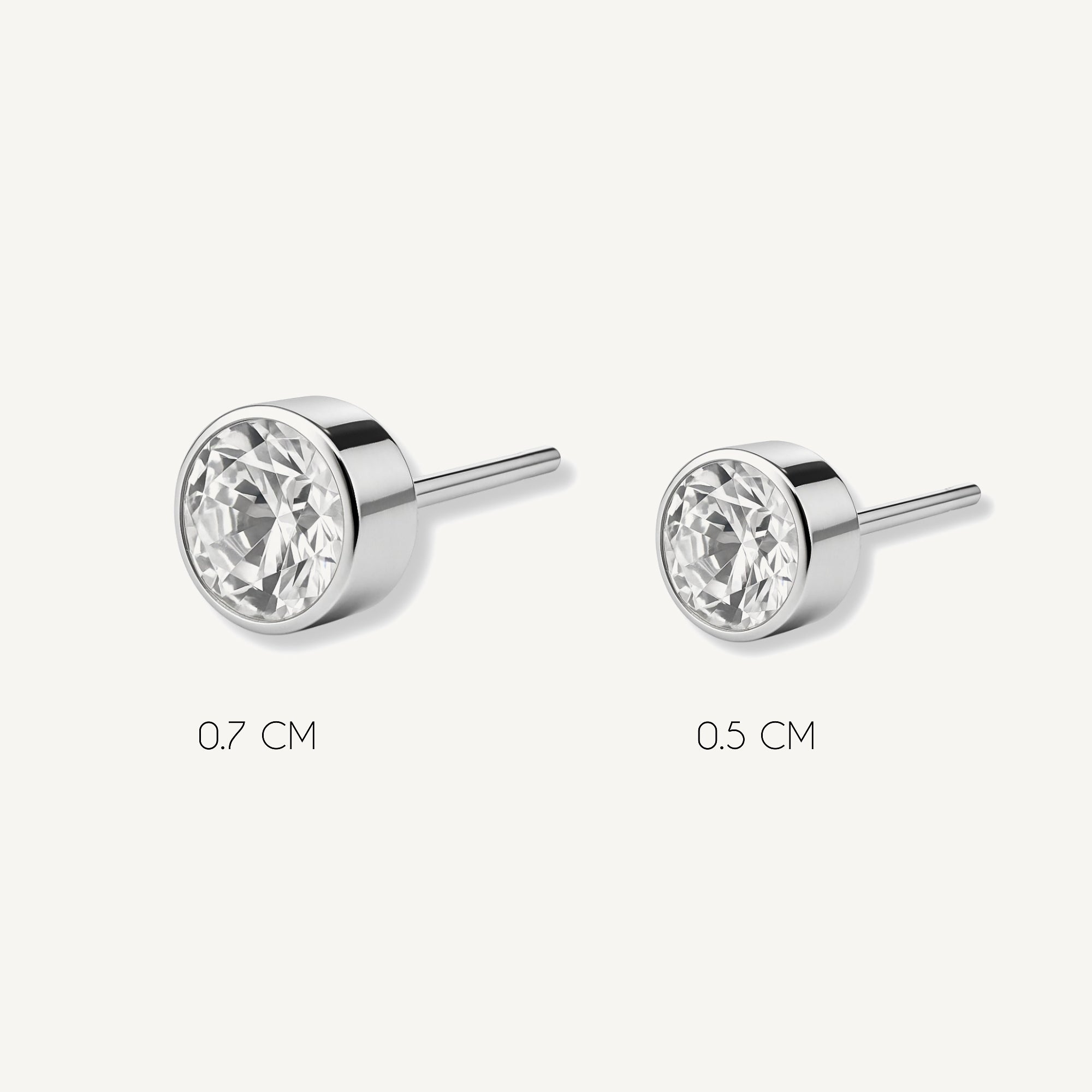 Aretes punto de luz biselado tamaños varios elaborados en plata 925 de AMBAR joyería fina