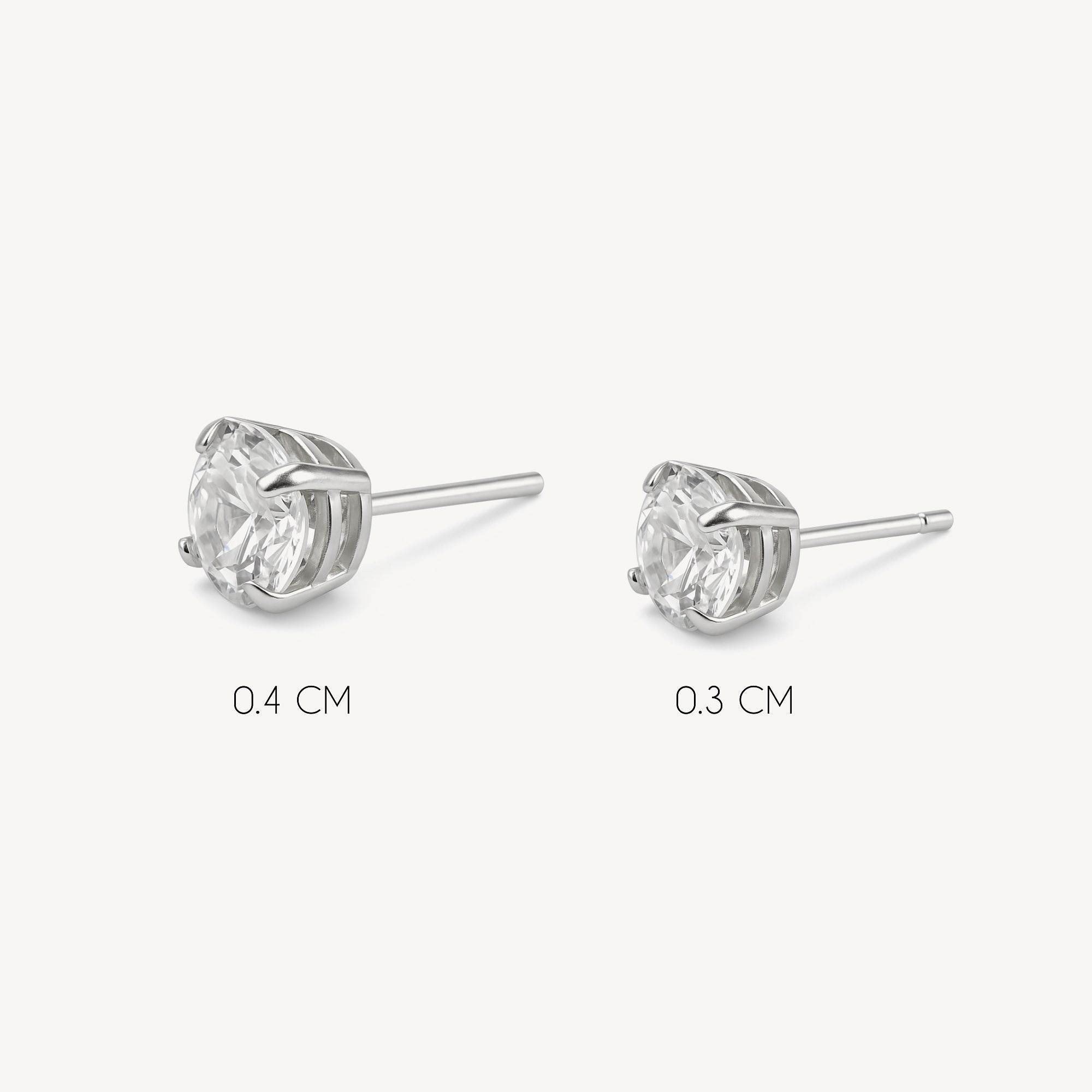 aretes chispita punto de luz con cristal elaborado en plata 925 de AMBAR joyería fina