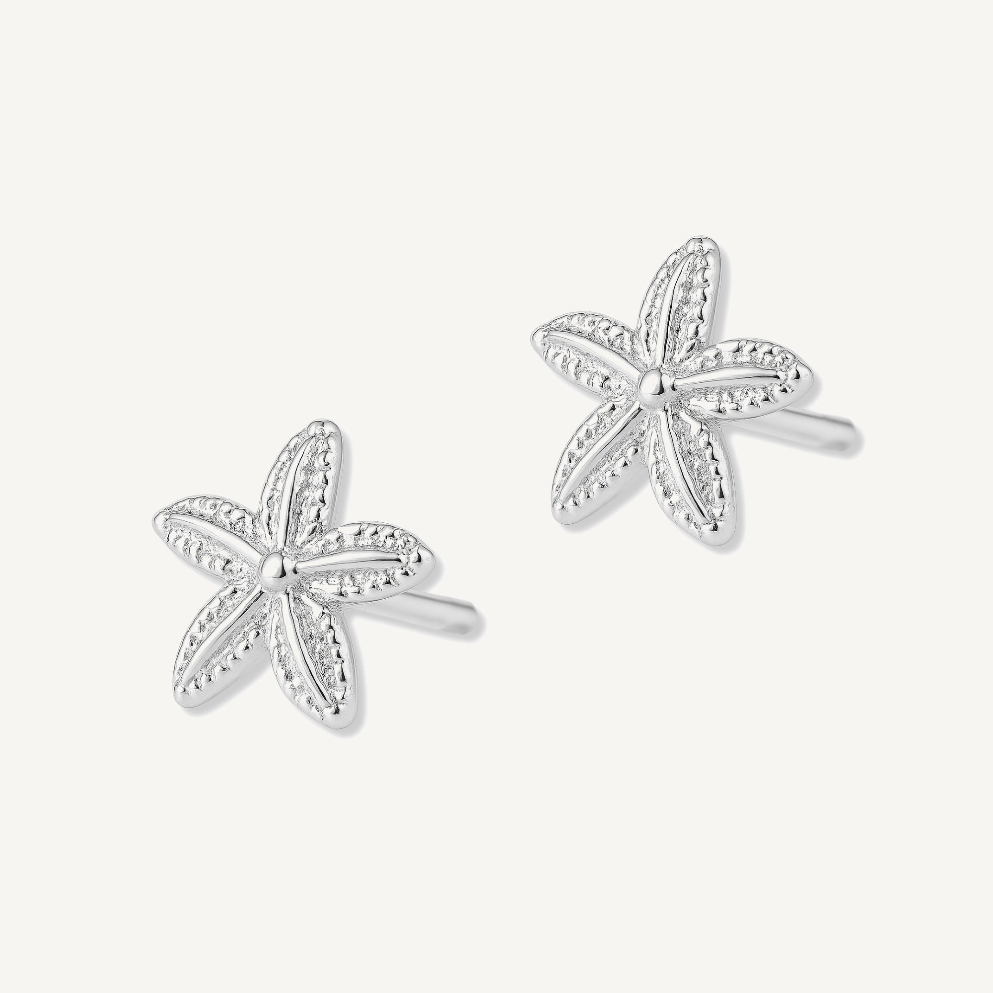 Aretes estrella de mar de 12mm elaborados en plata 925 de AMBAR joyería fina