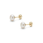 Par de aretes de perla natural blanca con base de gold filled de 14k.