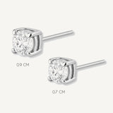 aretes punto de luz con cristal de tamaños varios elaborados en plata 925 de AMBAR joyería fina