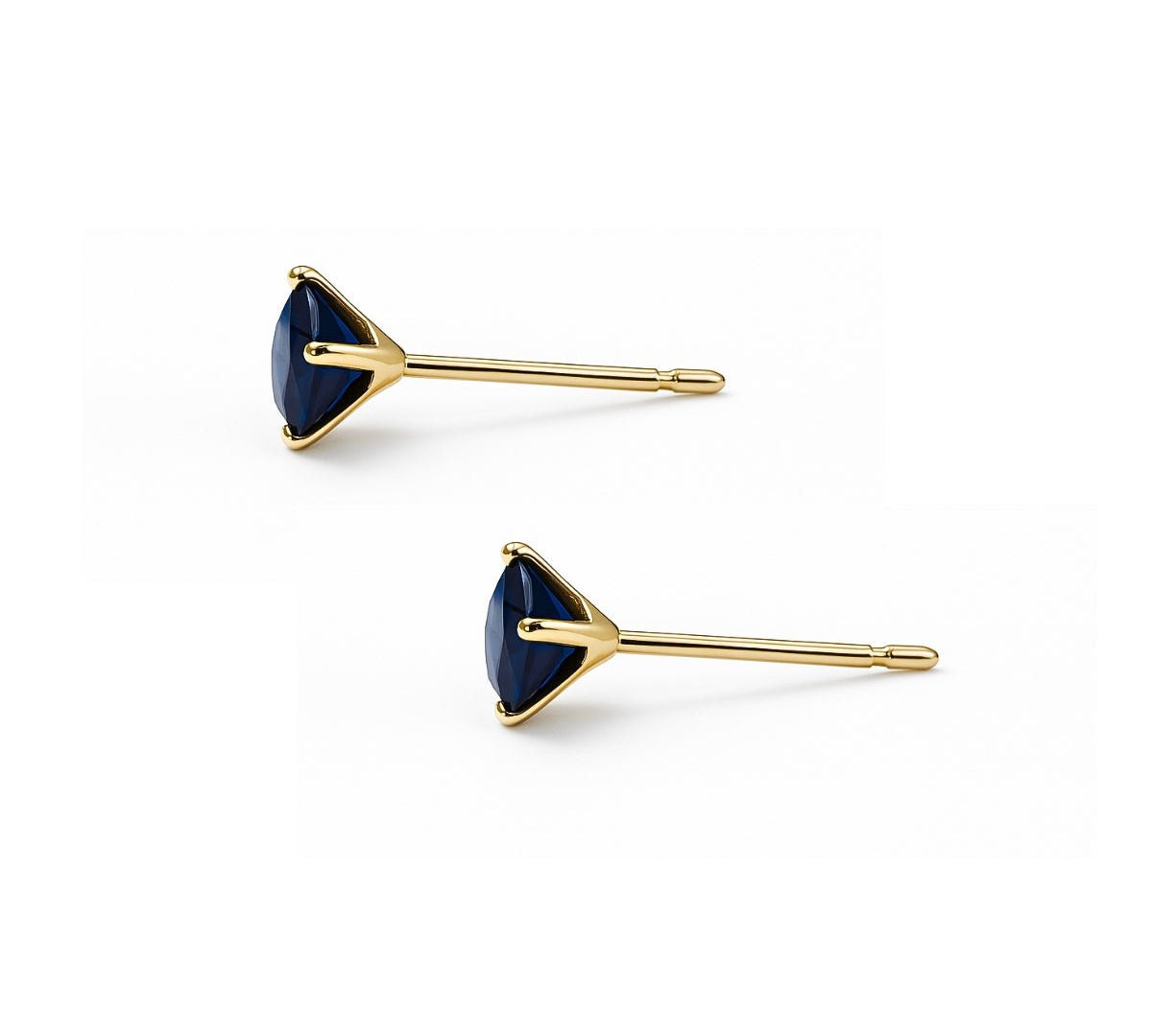 aretes punto de luz con circonita cubica  azul de perfil elaborado en oro laminado de AMBAR Joyería