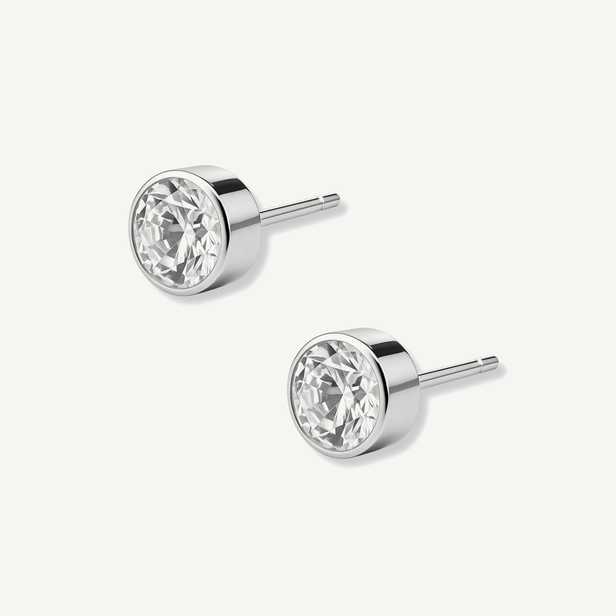 aretes punto de luz biselado de 7mm con cristal de swarovski elaborados en plata 925 de AMBAR joyería fina