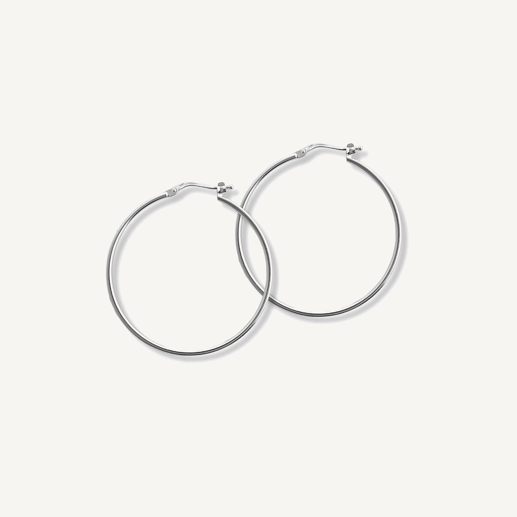 argollas amanda 2.4 cm lisas elaborados en plata 925 de AMBAR joyería fina