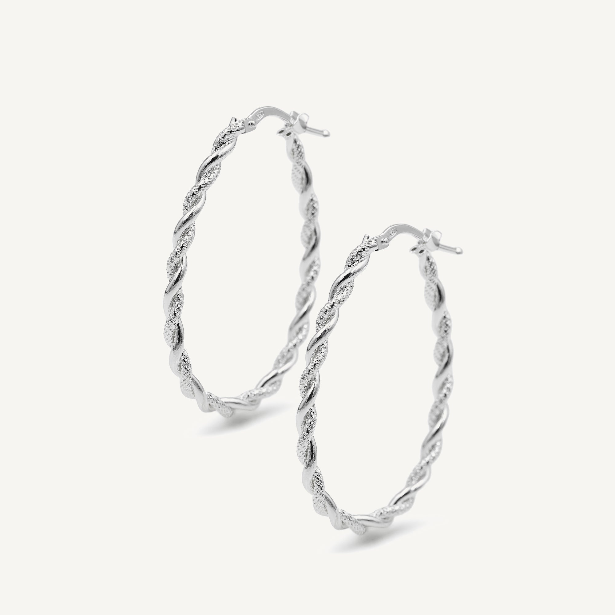 argollas filomena cordón texturadas ovaladas de 3.0 cm de alto elaborados en plata 925 de AMBAR joyería fina