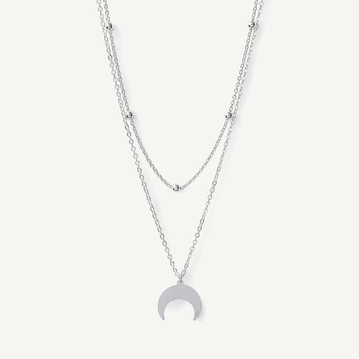 collar encpas de bolita y dije de Luna invertida elaborada en plata 925 de AMBAR joyería