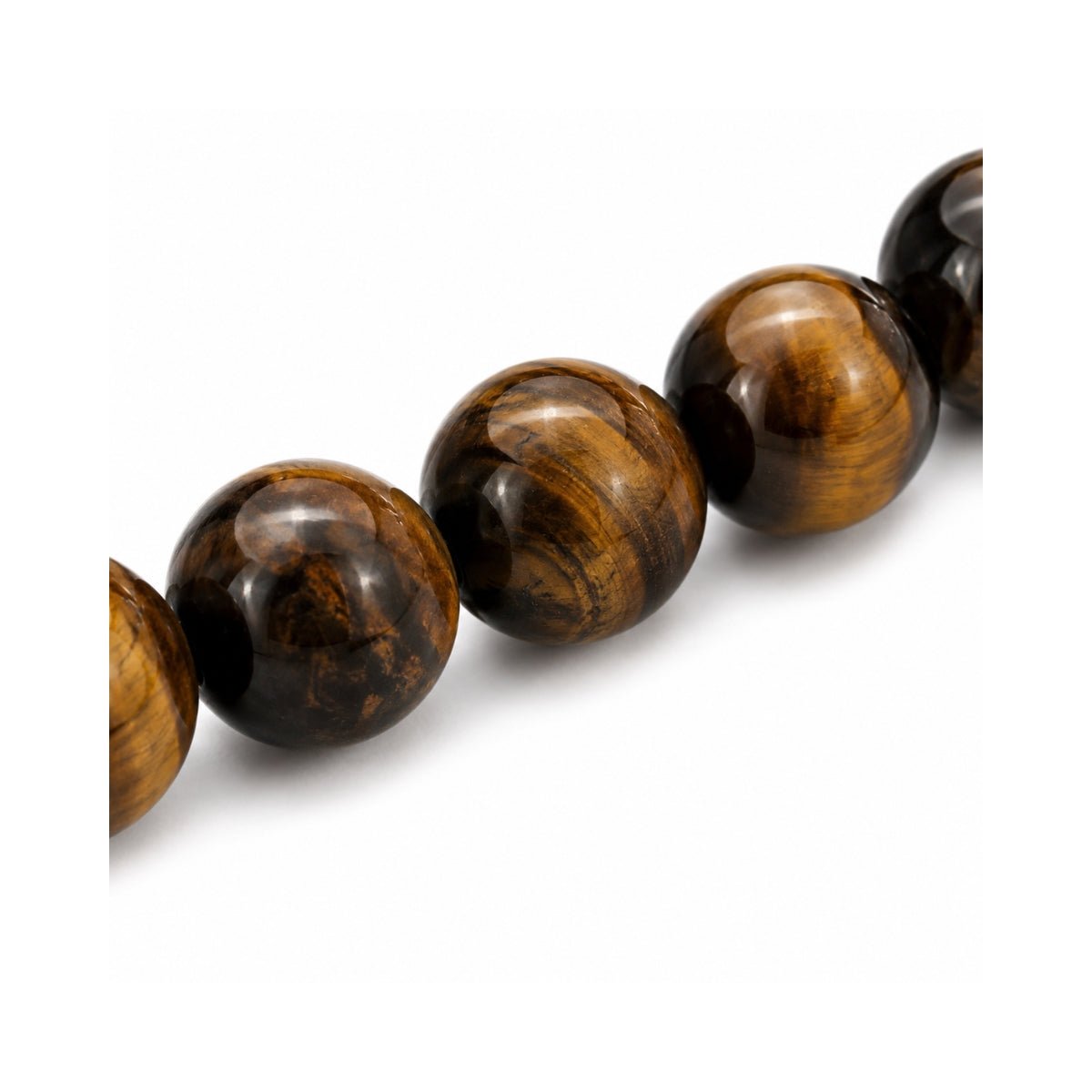 Primer plano de las esferas pulidas de piedra natural ojo de tigre de la pulsera para caballero elástica Hermes.