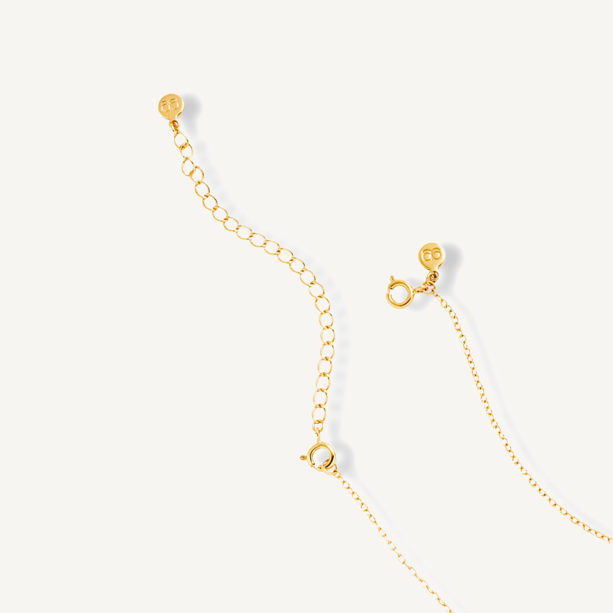Extension argollada de cadena y collar modelo enchapado en Oro 18k de AMBAR Joyería Fina