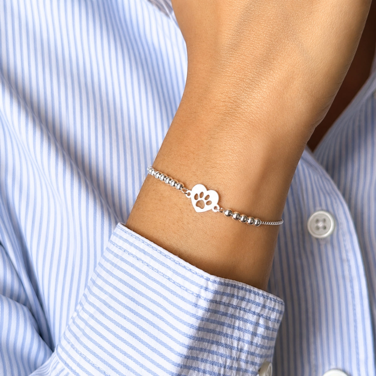 pulsera de plata 925 regulable con placa de huellita.