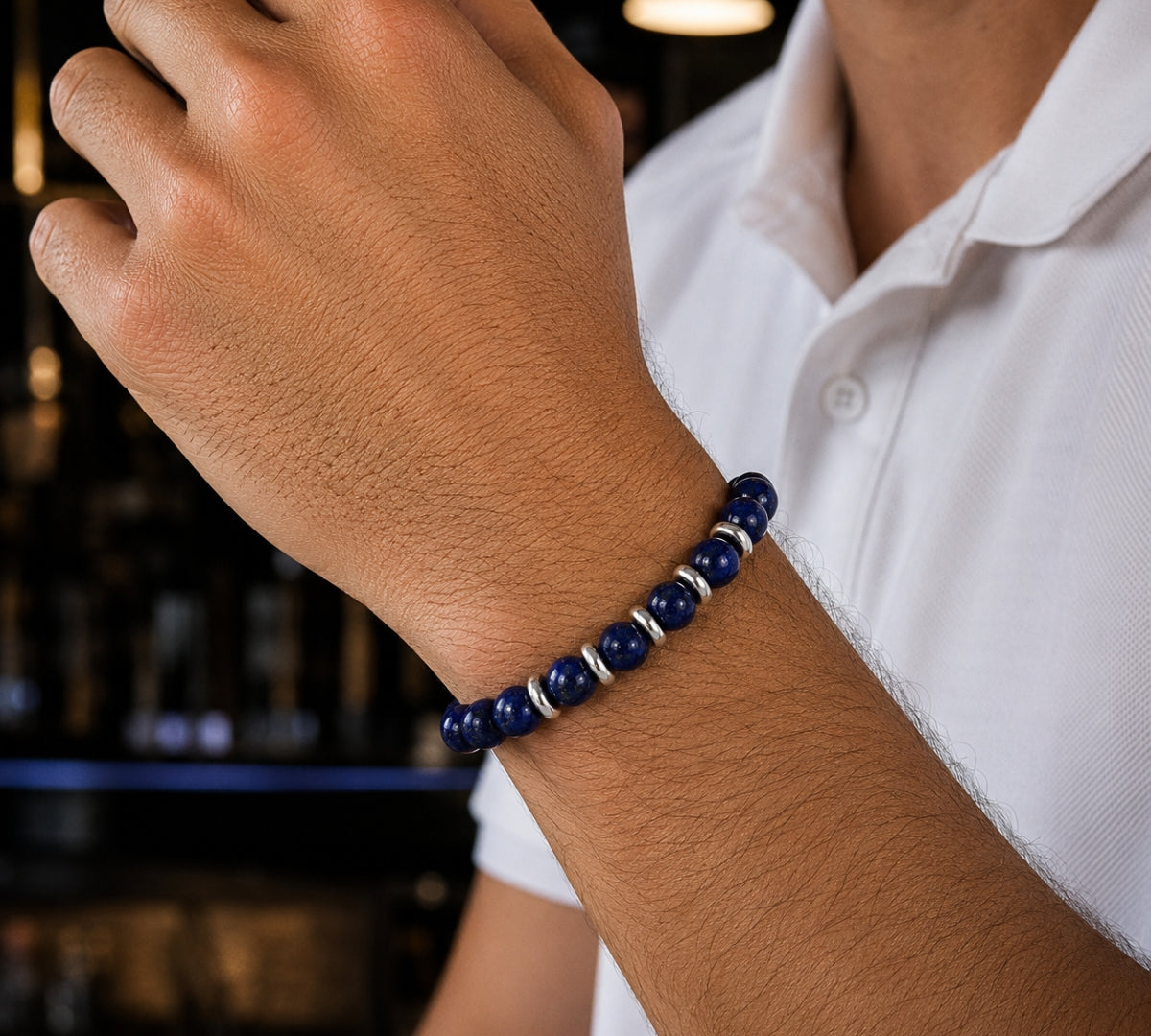 Pulsera masculina ajustable de esferas de piedra natural lapislázuli azul con argollas de plata 925.