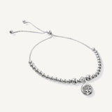 Pulsera anika con dije de punto de luz cristal con sistema regulable elaborado en plata 925 por AMBAR joyería 