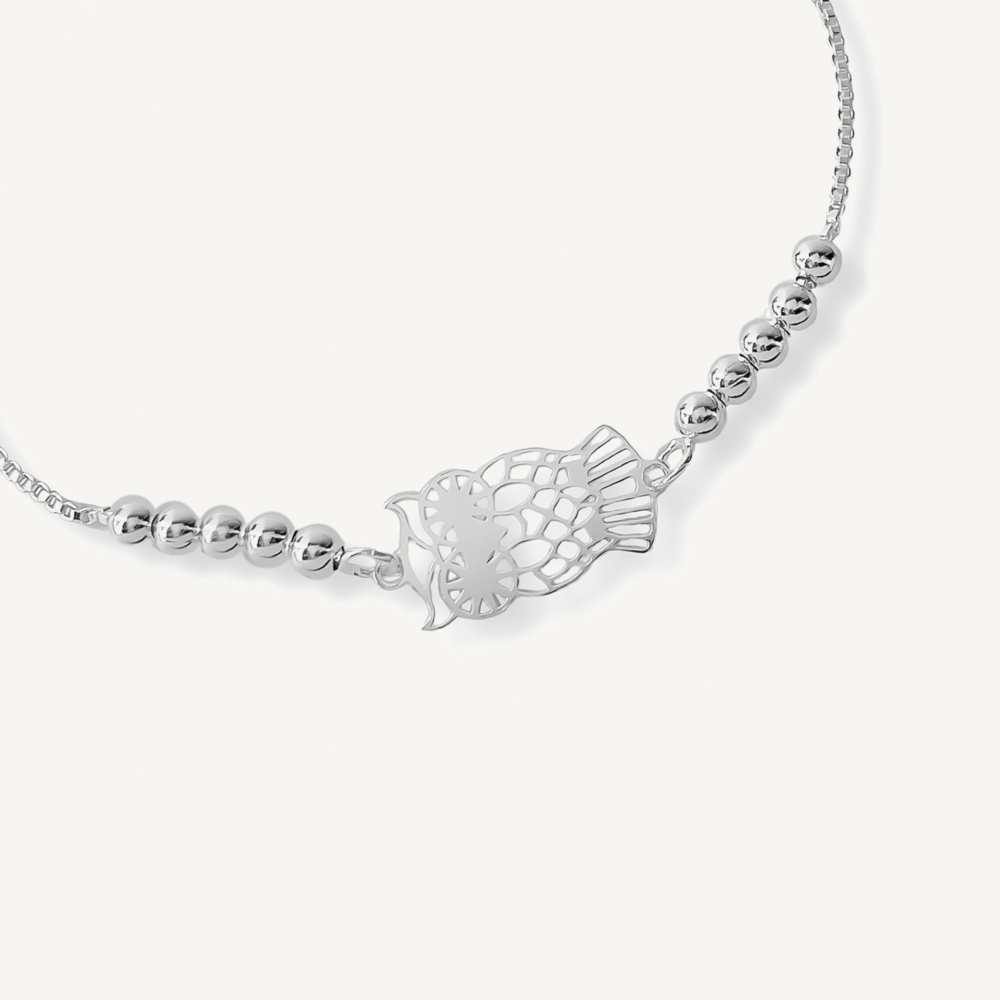 pulsera buho simbolo de sabiduria al detalle con bolitas y sistema regulable elaborada en plata 925 de AMBAR Joyería Fina