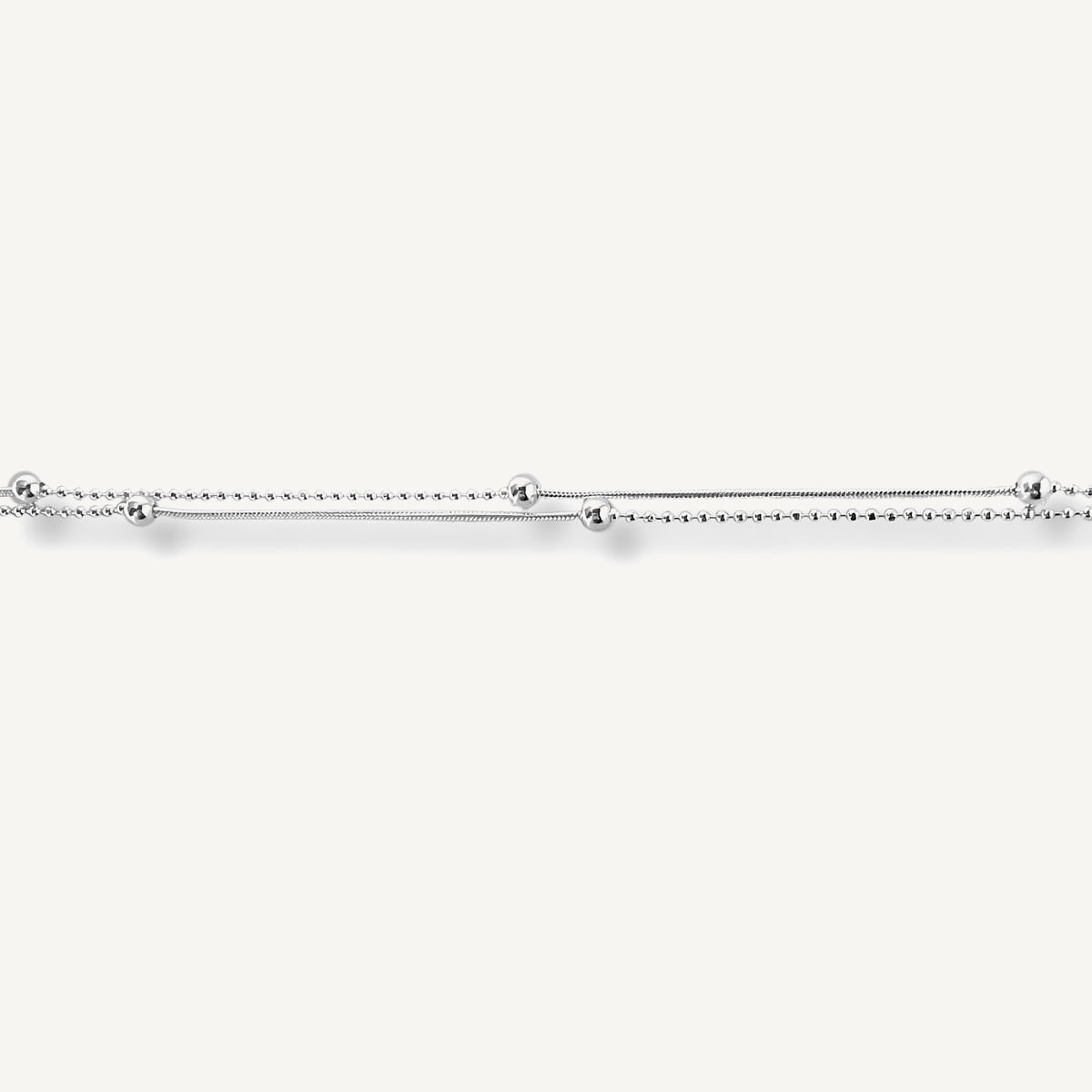 pulsera satélite de doble cadenas con bolitas  de cerca elaborada en plata 925 para AMBAR joyería
