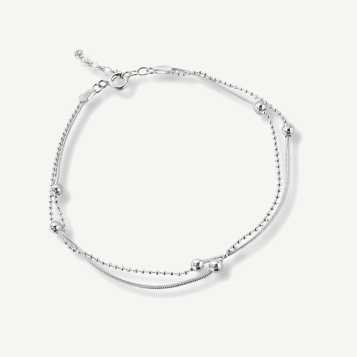 pulsera satélite de doble cadenas con bolitas  elaborada en plata 925 para AMBAR joyería