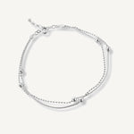 pulsera satélite de doble cadenas con bolitas  elaborada en plata 925 para AMBAR joyería