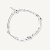 pulsera satélite de doble cadenas con bolitas  elaborada en plata 925 para AMBAR joyería