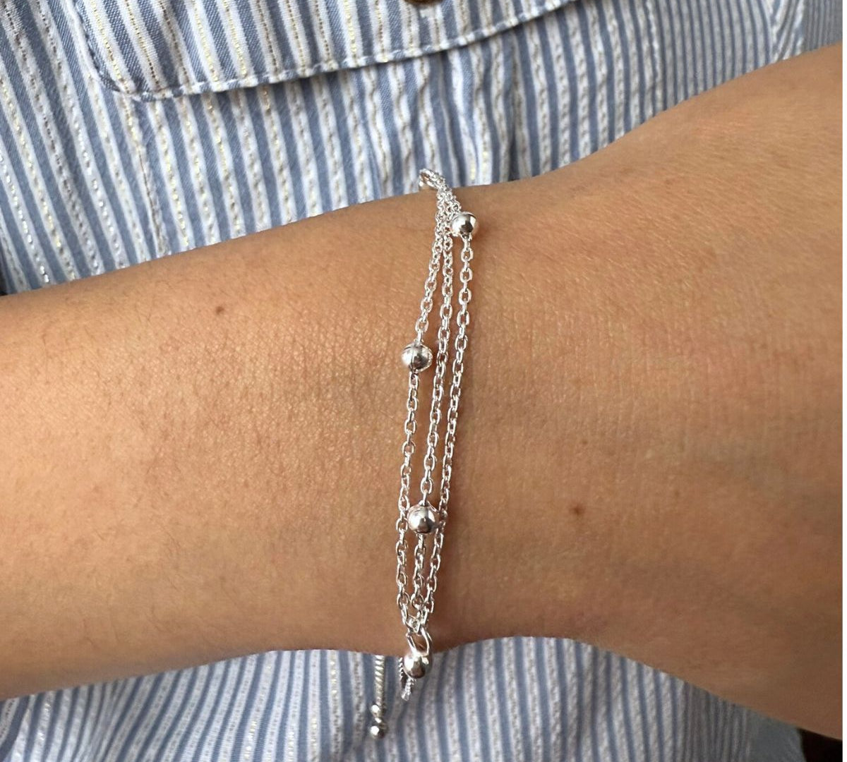 pulsera cadenitas y bolitas con sistema regulable en modelo elaborada en plata 925 de AMBAR Joyería Fina