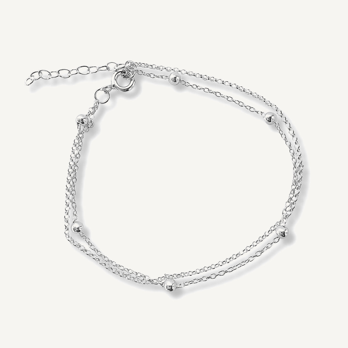 Pulsera de doble cadena con bolitas diseño juvenil elaborada en plata 925 para AMBAR joyería