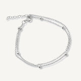 Pulsera de doble cadena con bolitas diseño juvenil elaborada en plata 925 para AMBAR joyería