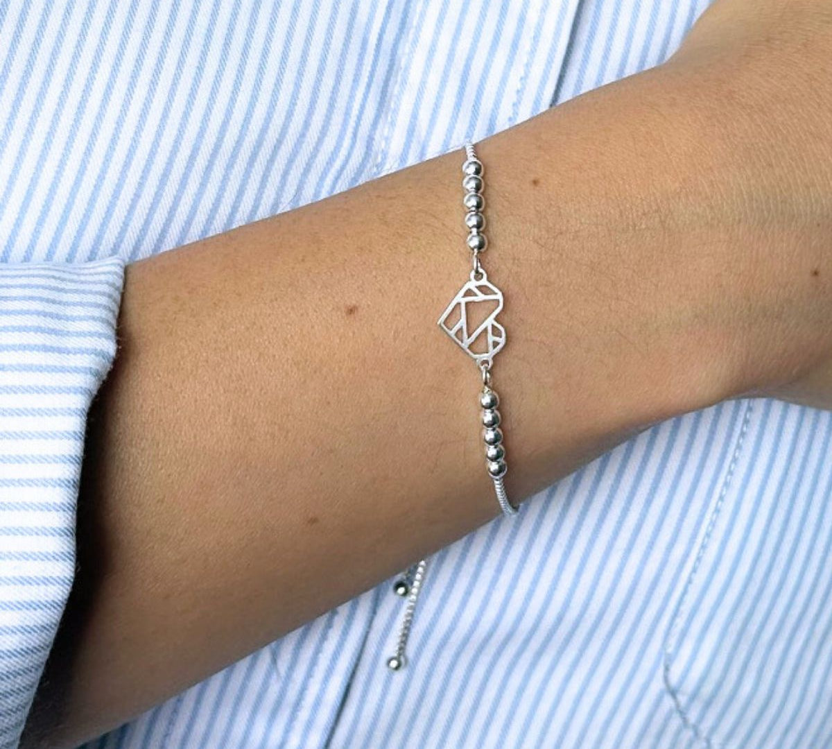 pulsera corazon origami con sistema regulable en modelo elaborada en plata 925 de AMBAR Joyería Fina