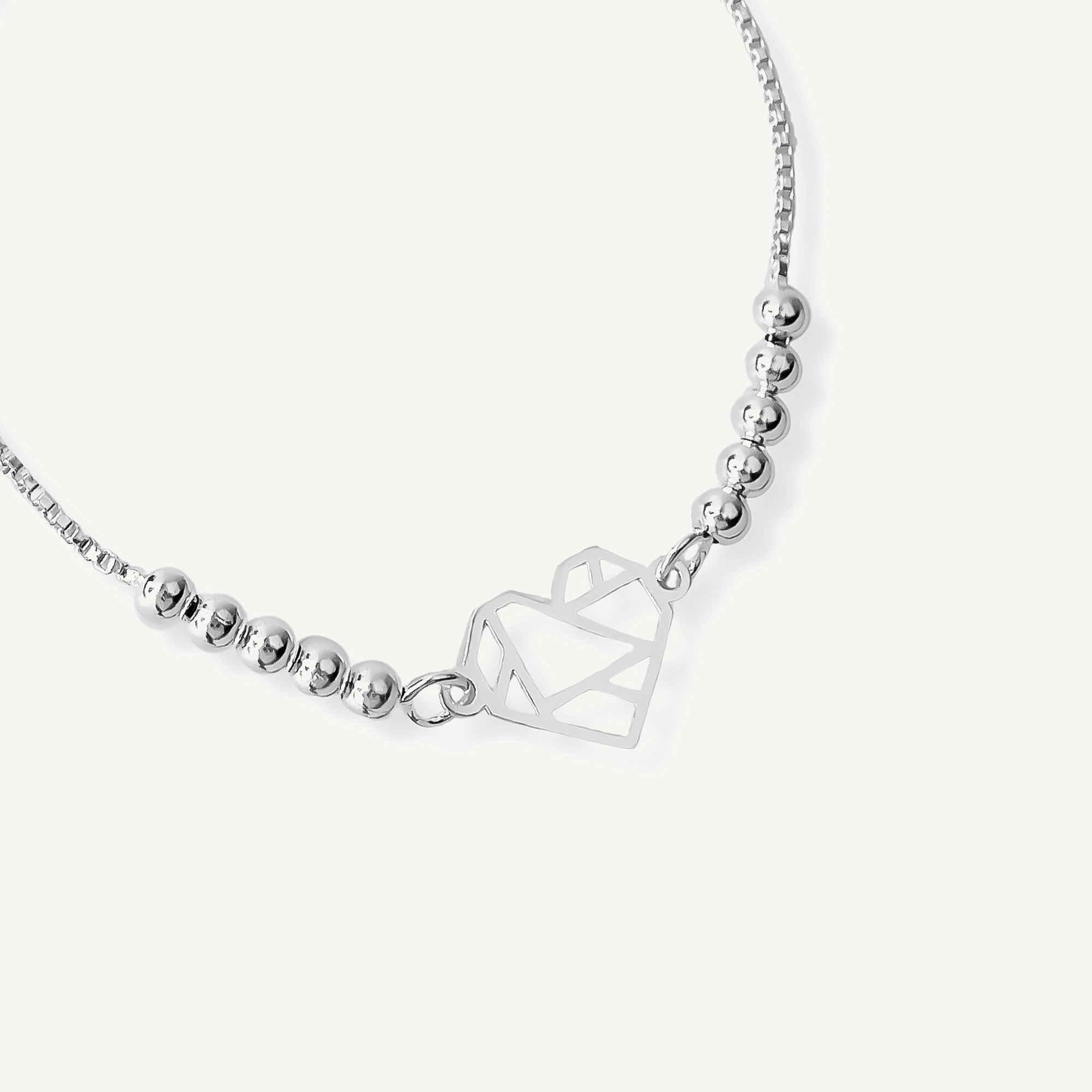 pulsera corazon origami con sistema regulable elaborada en plata 925 de AMBAR Joyería Fina