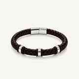 Pulsera Cuero Trenzado Urban de cuero marrón chocolate oscuro con broche y accesorios de acero inoxidable y bandas de silicona negra.
