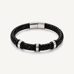 Pulsera Cuero Trenzado Urban de cuero negro con broche y accesorios de acero inoxidable y bandas de silicona negra.