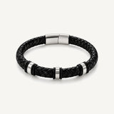 Pulsera Cuero Trenzado Urban de cuero negro con broche y accesorios de acero inoxidable y bandas de silicona negra.