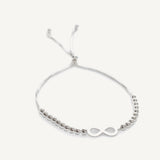 pulsera infinito al detalle con sistema regulable que se ajusta a cualquier muñeca elaborada en plata 925 de AMBAR Joyería 