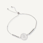 pulsera flor calada con sistema  regulable elaborada en plata 925 de AMBAR Joyería Fina