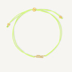 Pulsera hilo amarillo con inicial  r enchapada en oro 18K de AMBAR joyería fina