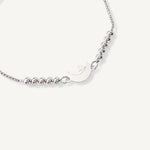 pulsera lunita y estrella con sistema  regulable al detalle elaborada en plata 925 de AMBAR Joyería Fina