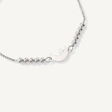 pulsera lunita y estrella con sistema  regulable al detalle elaborada en plata 925 de AMBAR Joyería Fina
