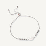 pulsera lunita y estrella con sistema  regulable elaborada en plata 925 de AMBAR Joyería Fina