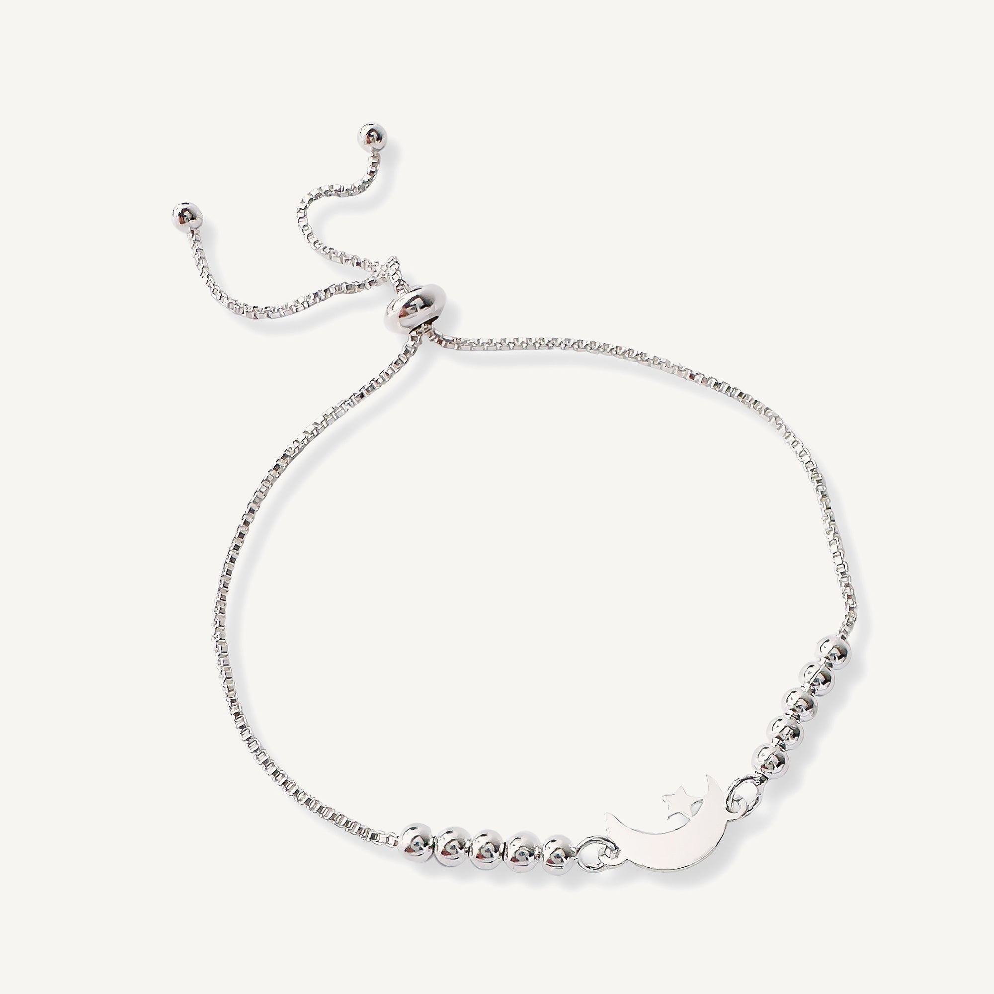 pulsera lunita y estrella con sistema  regulable elaborada en plata 925 de AMBAR Joyería Fina