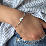 pulsera mariposita plana en modelo con bolitas y sistema regulable elaborada en plata 925 de AMBAR Joyería Fina