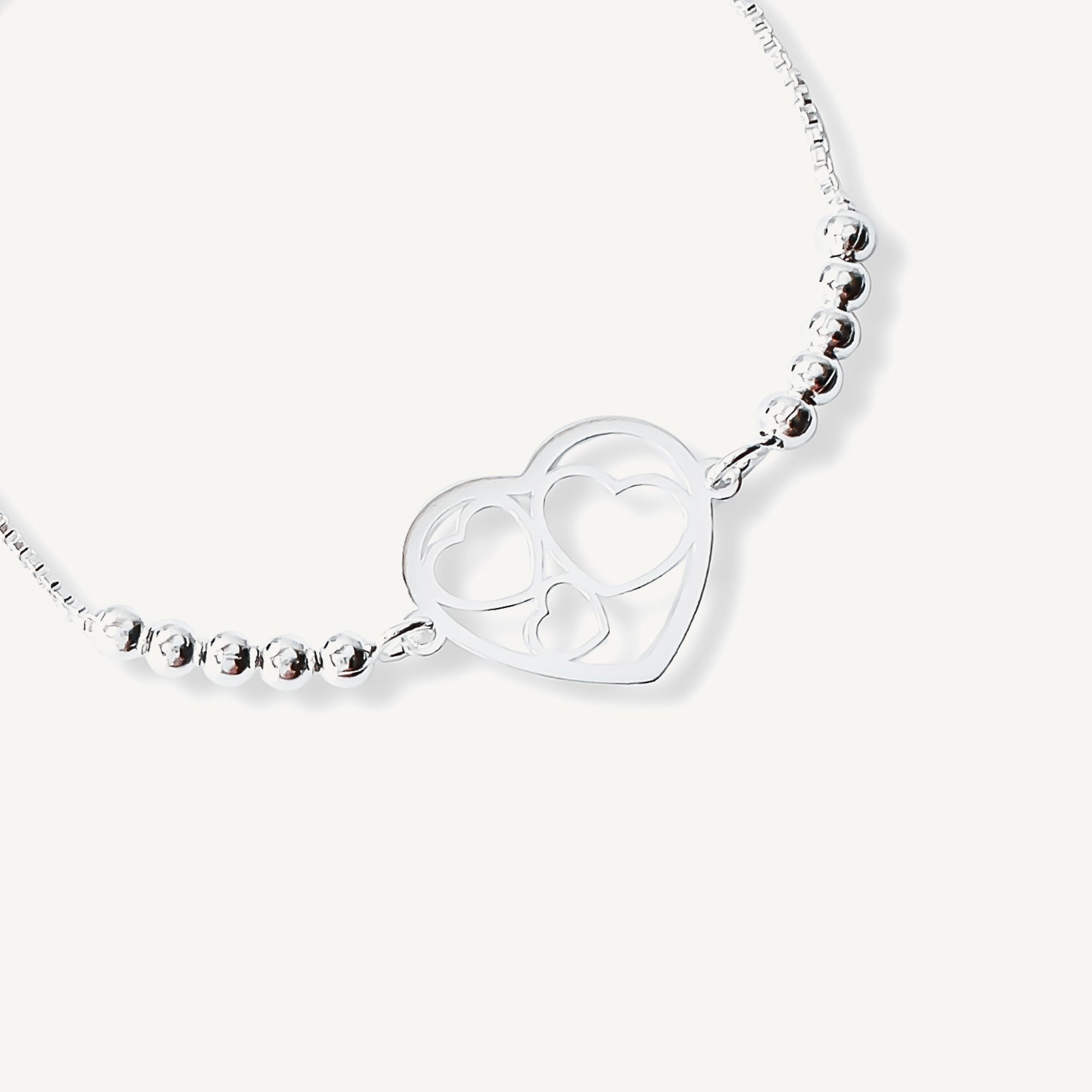 pulsera corazon mis amores con bolitas al detalle y sistema regulable elaborada en plata 925 de AMBAR Joyería Fina