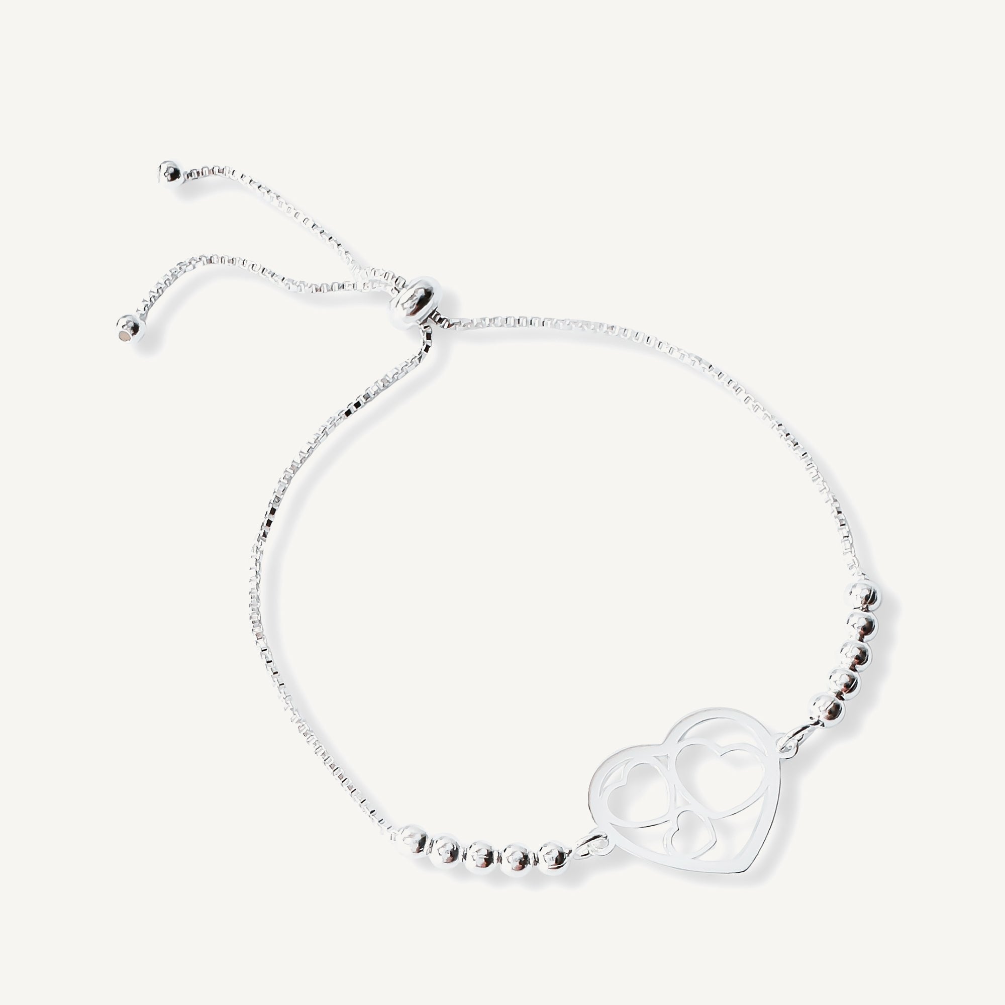 pulsera corazón mis amores con bolitas y sistema regulable elaborada en plata 925 de AMBAR Joyería Fina