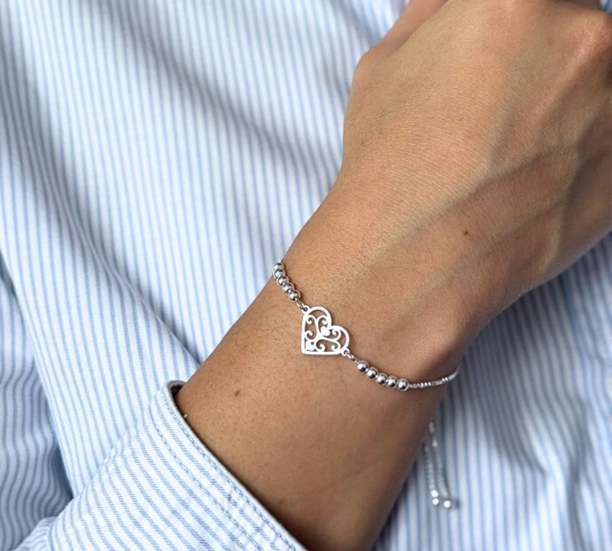 pulsera con sistema regulable y dije de corazones 3 en 1 en modelo elaborada en plata 925 de AMBAR Joyería Fina