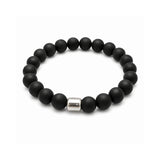 Pulsera elástica para hombre modelo Orión con hilo de silicona, esferas de Onix Negro y tubo cilíndrico central de plata 925 sobre fondo blanco.