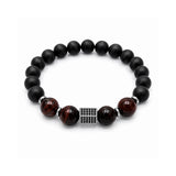 Pulsera Ónix y Ojo de Tigre Noir para hombre con piedras naturales y detalles de acero de AMBAR joyería fina