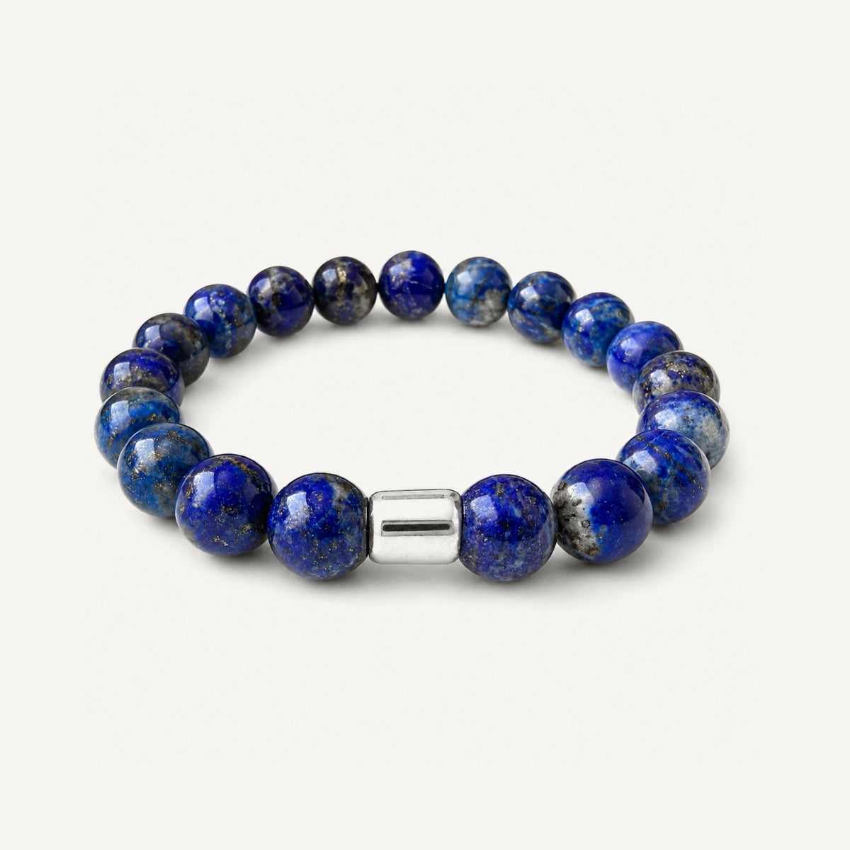 Pulsera para hombre con piedras naturales de lapislázuli de 10 mm y detalle central en plata 950.