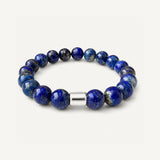 Pulsera para hombre con piedras naturales de lapislázuli de 10 mm y detalle central en plata 950.