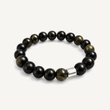 Pulsera Orion Grand para hombre con obsidiana natural de 10 mm y tubo central de Plata 925.