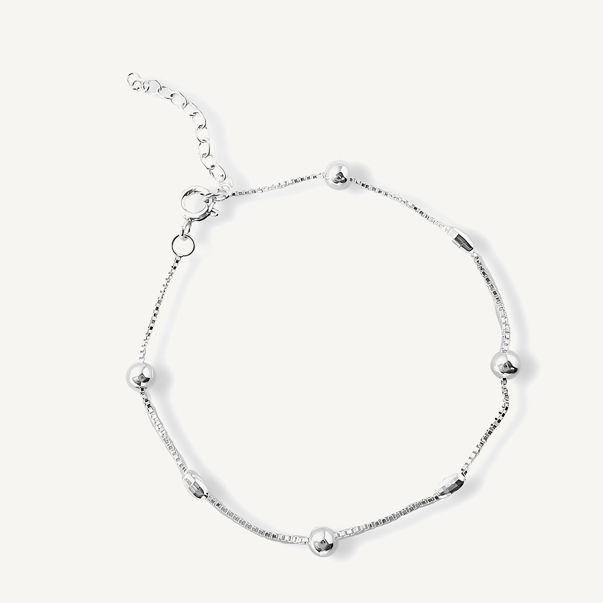 pulsera de ovalitos y bolitas moderna y versátil elaborada en plata 925 par AMBAR joyería